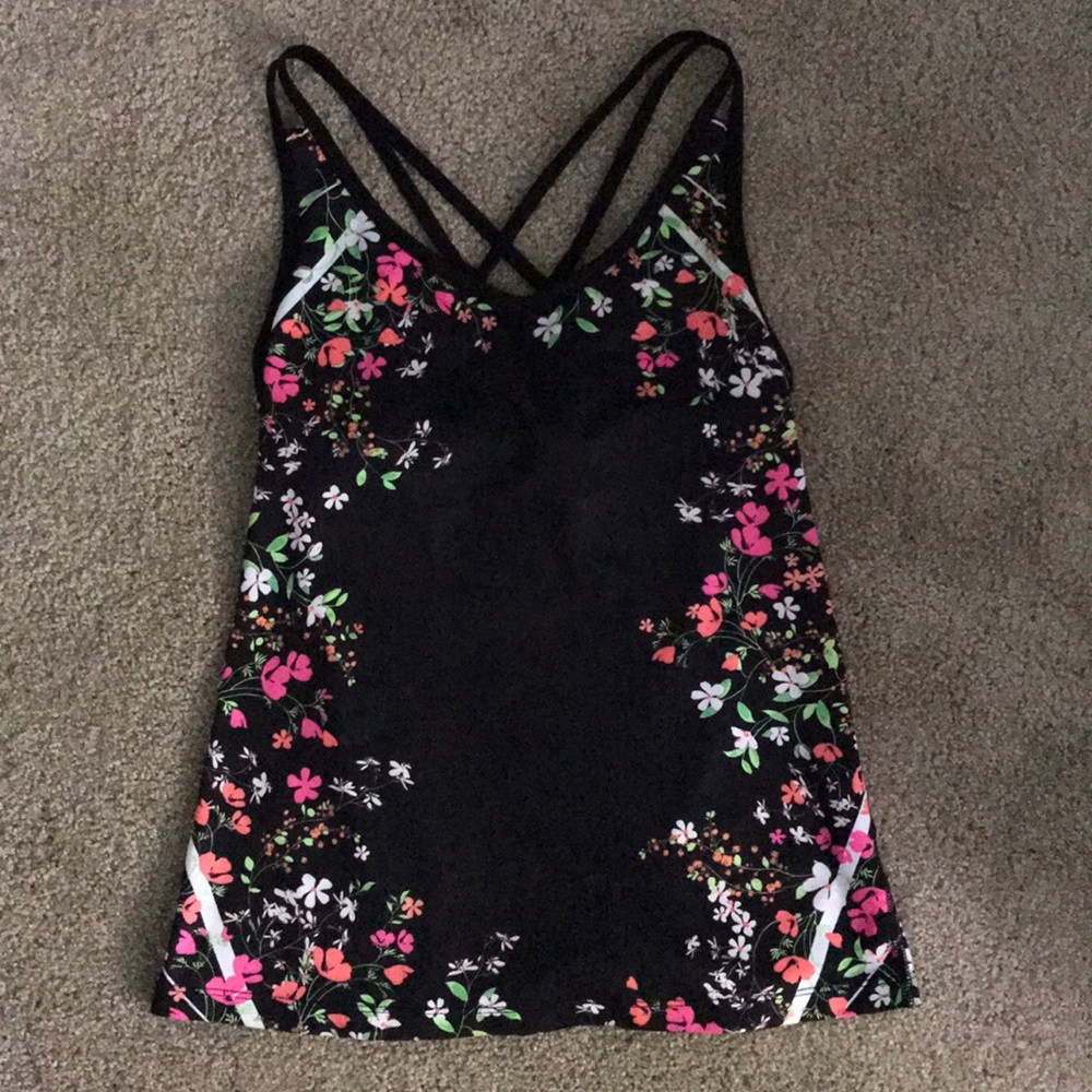 Used once active top with sure cute flowers